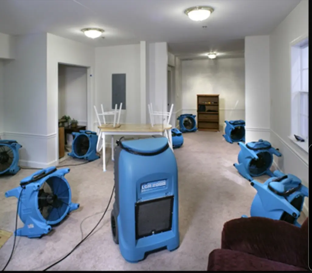 Air movers and dehumidifier setup for Water Damage Restoration in Security-Widefield